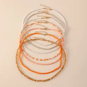 Bohemian layered beaded necklace set for women, colorful seed bead choker jewelry gift.