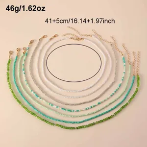 Bohemian layered seed bead necklace set featuring seven delicate strands in green.