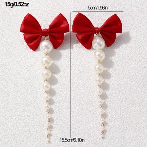 Elegante rote Schleife kaskadierende Perlen lange Quasten Ohrringe Damen Modeschmuck.