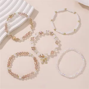 Schickes 5-teiliges Perlenarmband-Set für Damen mit Kristallperlen und niedlicher Schleife.