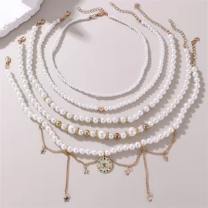 Mehrlagige Perlenkette Set mit bösem Blick und Stern Anhängern, stilvoller Damenschmuck.