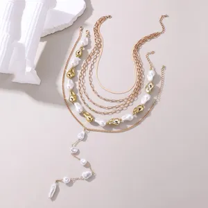 Exquisite mehrlagige Goldkette mit Perlen, elegantes Y-förmiges Design für schicken Stil.