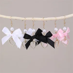 Süße Schleifen Perlen Herz Ohrringe für Damen, elegante lange hängende Modeschmuck.