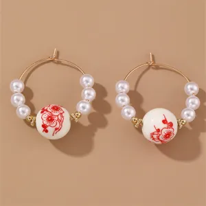 Vintage Chinese style pearl hoop earrings with red floral porcelain beads for women fashion jewelry.