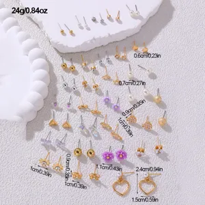 Großhandel 30 Paar Ohrstecker Set mit Perlen, Herzen und geometrischen Designs für Frauen.