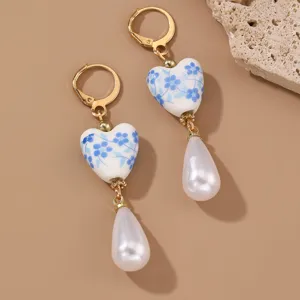 Chic blue and white porcelain heart earrings with elegant pear-shaped pearl drops for women.