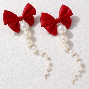 Elegante rote Schleife lange Perlen Quasten Ohrringe für Damen modischer Schmuck.