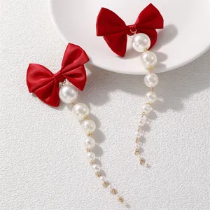 Elegante rote Schleife Kunstperle lange Quaste Ohrringe für Damen, Herbst Winter Mode Schmuck.