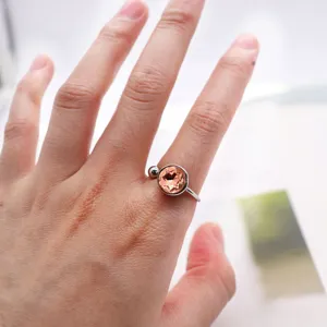 Close-up detail of the cold-style titanium steel open joint ring with sparkling crystal.