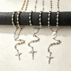 Catholic rosary necklace set with metal beaded chains, crucifix, and religious pendant medals.