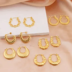 Set of stylish gold-plated stainless steel hoop earrings with various geometric textures.