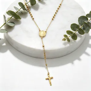 Gold stainless steel rosary bead crucifix long necklace pendant, elegant detailed jewelry view.
