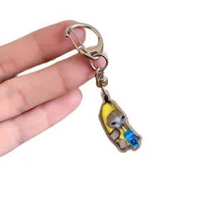 Cute funny crying cat in banana keychain acrylic pendant fashion bag accessory charm