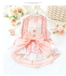 Cute pink polka dot pet princess dress with white lace and bow for small dogs and puppies.