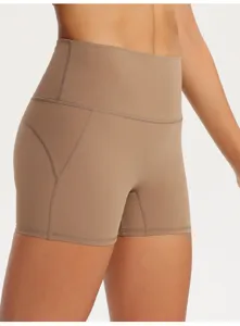 Pantaloncini da yoga stretti a vita alta da donna, dettaglio abbigliamento fitness sport.