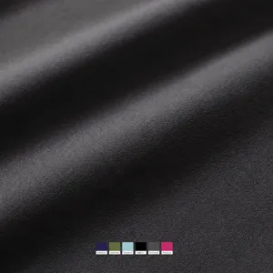 Primer plano de tela de pantalones de yoga de cintura alta, suave y elástica.