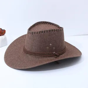 Detailed view of the brown cotton linen cowboy sun hat showing woven texture and side eyelets.