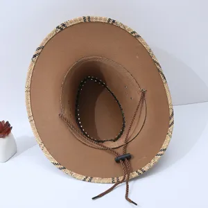 Detailed view of the men's summer sun hat, featuring wide straw brim and secure chin strap.