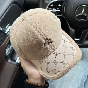 Thickened sherpa baseball cap with embroidered letters and rhinestone brim for winter warmth.