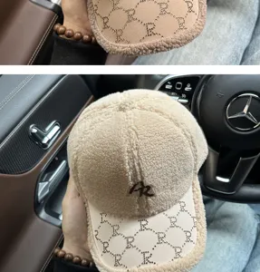 Detailed view of winter lamb wool baseball cap with rhinestone brim and letter embroidery.