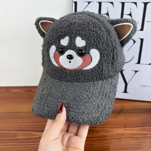 Detailed view of the dark grey fleece baseball cap with cute animal ears and embroidery.