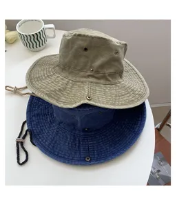 Classic washed cotton bucket hat for outdoor camping, sun protection, and casual travel wear.