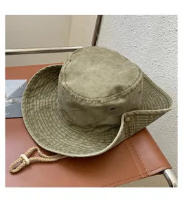 Washed distressed outdoor bucket hat with rope, ideal for hiking and camping sun protection.