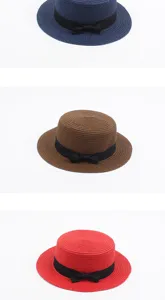 British vintage flat top straw hat with black bow. Elegant summer sun protection beach hat.