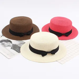 Classic retro straw boater hat with black bow, elegant flat top sun hat for women and girls beach.