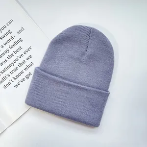 Solid color knit beanie for winter, warm soft pullover ski cap, casual apparel accessory.