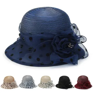 Women summer sun protection mesh bucket hat with polka dots and flower, breathable straw hat.