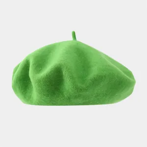 Green wool beret detail shot, soft felt texture close up, minimalist vintage painter hat.
