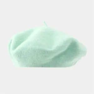 Wool beret detail view, solid color painter hat, soft fabric texture close up, minimalist style.