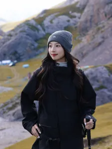 Grey knit beanie for women, outdoor hiking winter wool hat with mountain embroidery design.