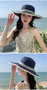 Detailed view of women's French lace bow straw sun hat, perfect for summer beach holidays.
