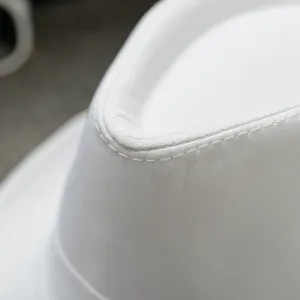 White plain cloth fedora hat close up view, classic British jazz hat for sun protection.