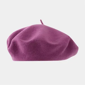 Purple wool beret detail shot, cozy winter textured fabric, vintage painter hat close up.