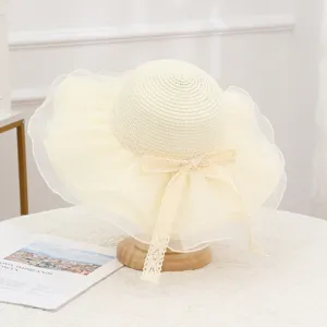 Women chic straw sun hat with mesh brim and sweet lace ribbon bow for summer holiday.