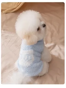 Cute fluffy blue pet sweater detail view, soft warm winter sleeveless dog clothes for small pets.