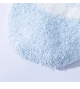 Soft blue fleece pet clothes detail shot, warm fluffy fabric winter dog apparel close up