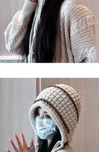 Handmade knitted woolen hat with ear flaps, cozy winter pullover cap for women and girls.