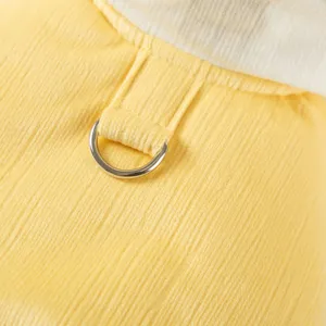 Yellow corduroy pet clothes detail with metal D-ring and soft collar, cozy winter dog apparel.