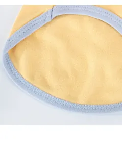 Close-up detail of yellow pet fleece base shirt with light blue trim for autumn winter.