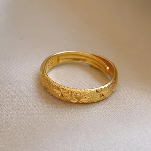 Gold open adjustable ring with starry textured design, elegant fashion minimalist jewelry