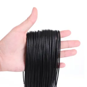 Close-up detail of bulk black waxed necklace cords for DIY jewelry making accessories
