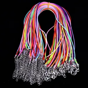 Bundle of colorful waxed DIY necklace cords with lobster clasps and extension chains