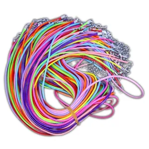 Detailed view of colorful DIY necklace cord bundle with secure metal lobster clasps