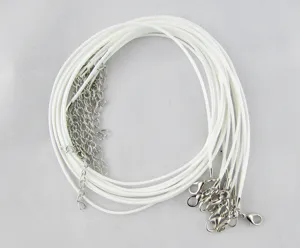 Close-up detail view of white DIY wax cord necklaces with silver extension chains