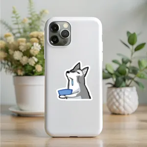 Detail view of a white phone case featuring a cute cartoon husky dog sticker for daily use.