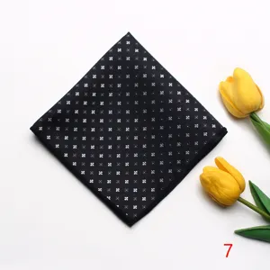 Black jacquard pocket square with floral pattern, elegant formal suit handkerchief for men.